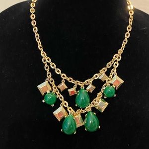 Very pretty gold tone necklace W green stones. good condition, choker 2 strands